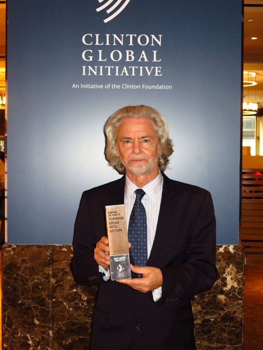 Hermann Bühlbecker bei der Clinton Global Initiative in New York 2014; er erhielt den Award für 10-jährige Unterstützung und Ideengeberschaft für die Ziele der Clinton Global Initiative