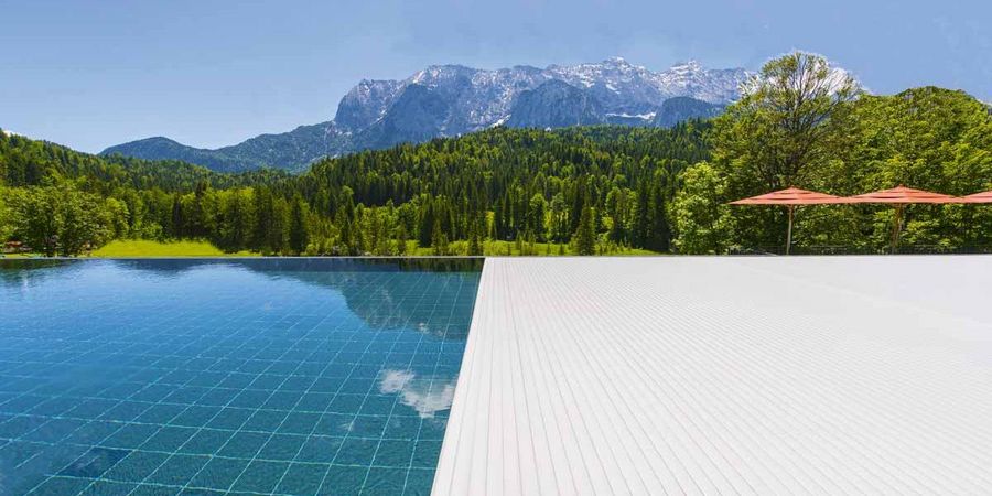 Rollo Solar Schwimmbadabdeckung Schloss Elmau