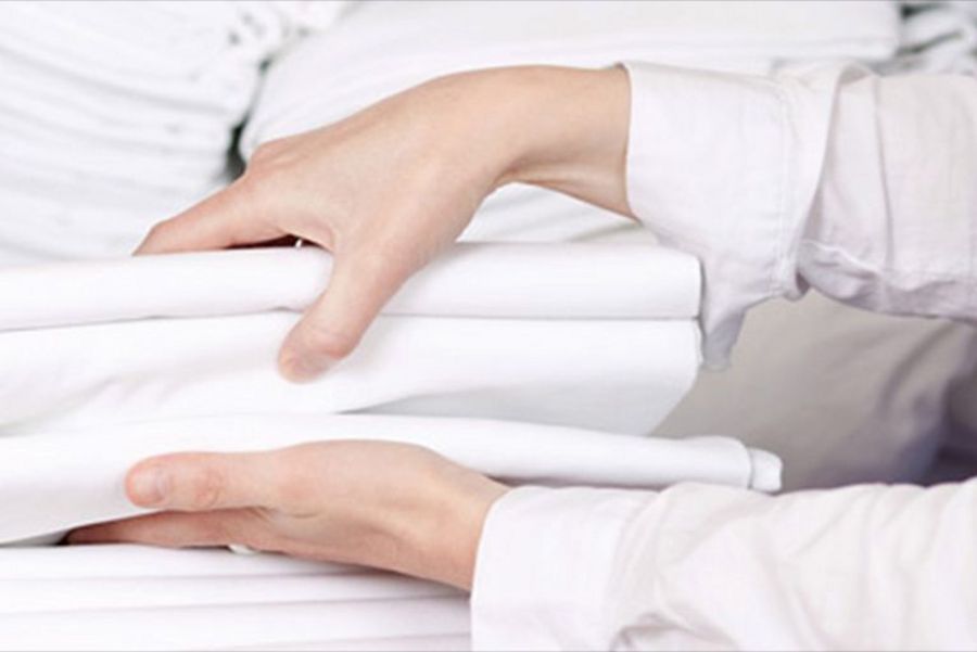 Geiger Textil Falten der Wäsche