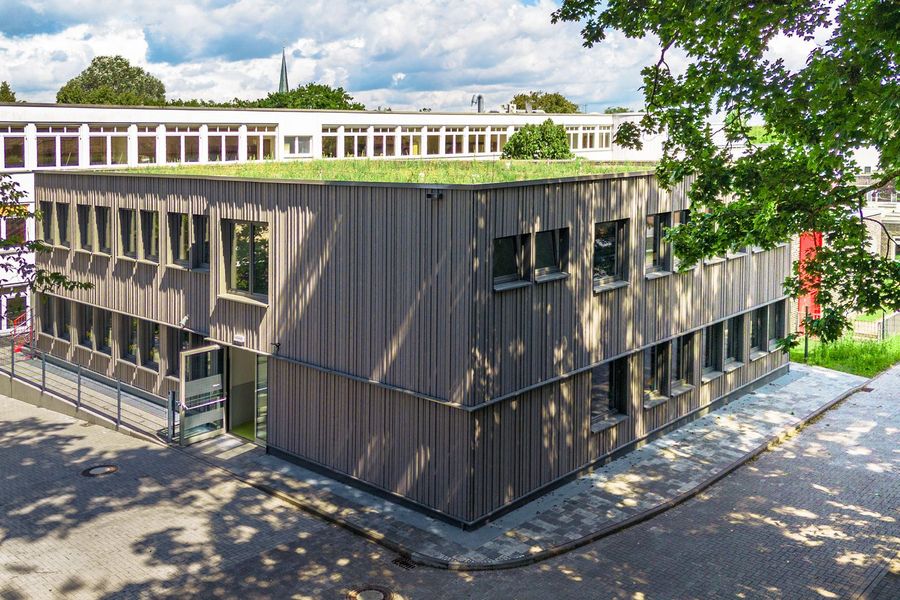 Adapteo Modulare Gebäude zur Miete Holz mit Gründach Adapteo Modulare Gebäude zur Miete Holz mit Gründach